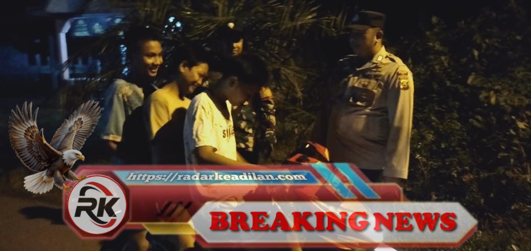 Sinergi Babinsa dan Babinkamtibmas: Patroli Siskamling Malam Jaga Ketertiban Desa Menang Raya OKI